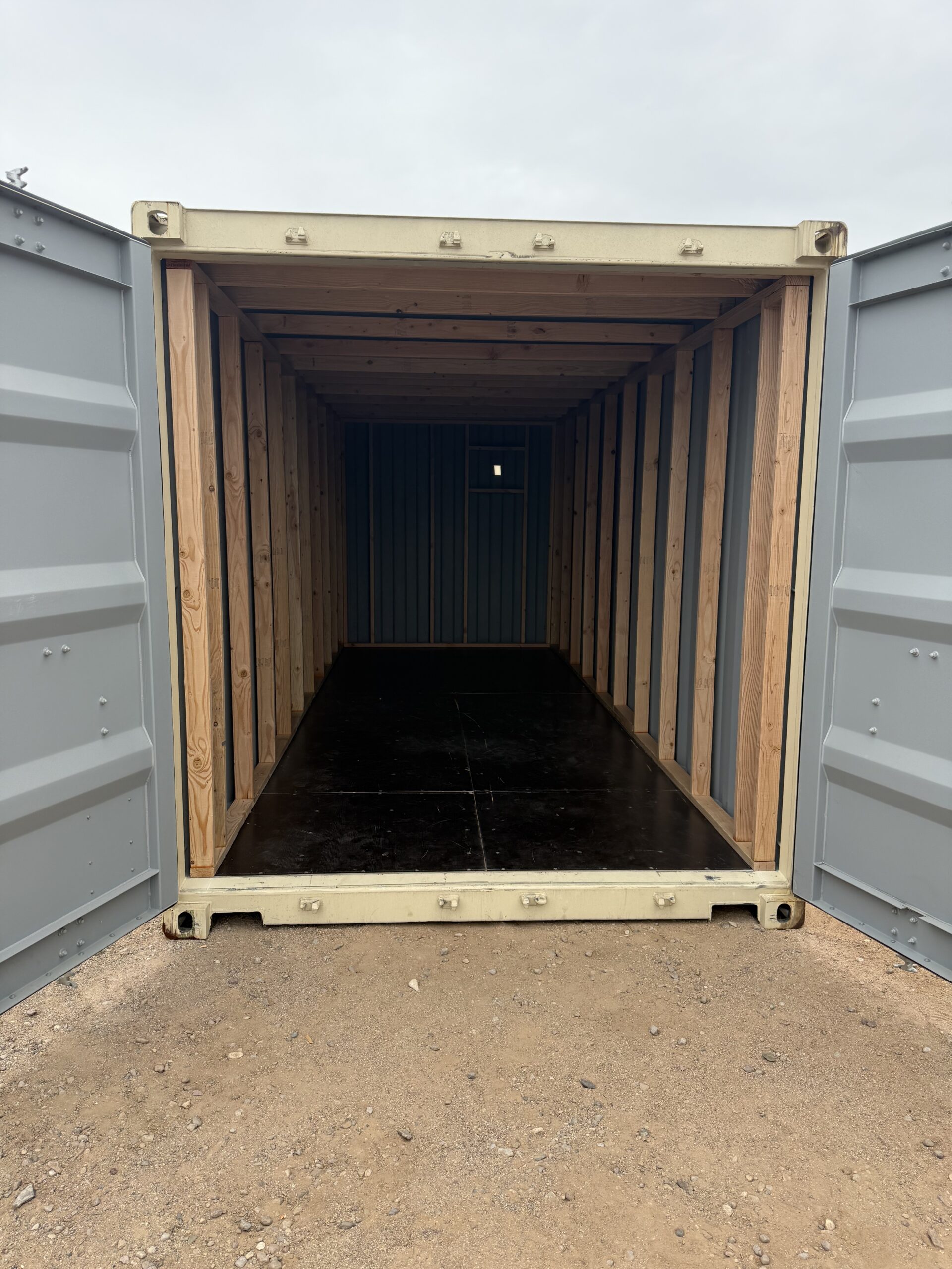 Interior framing inside a 20-foot shipping container being converted into a custom tack shed by Conex Creation & Supply for a Southern Arizona ranch.